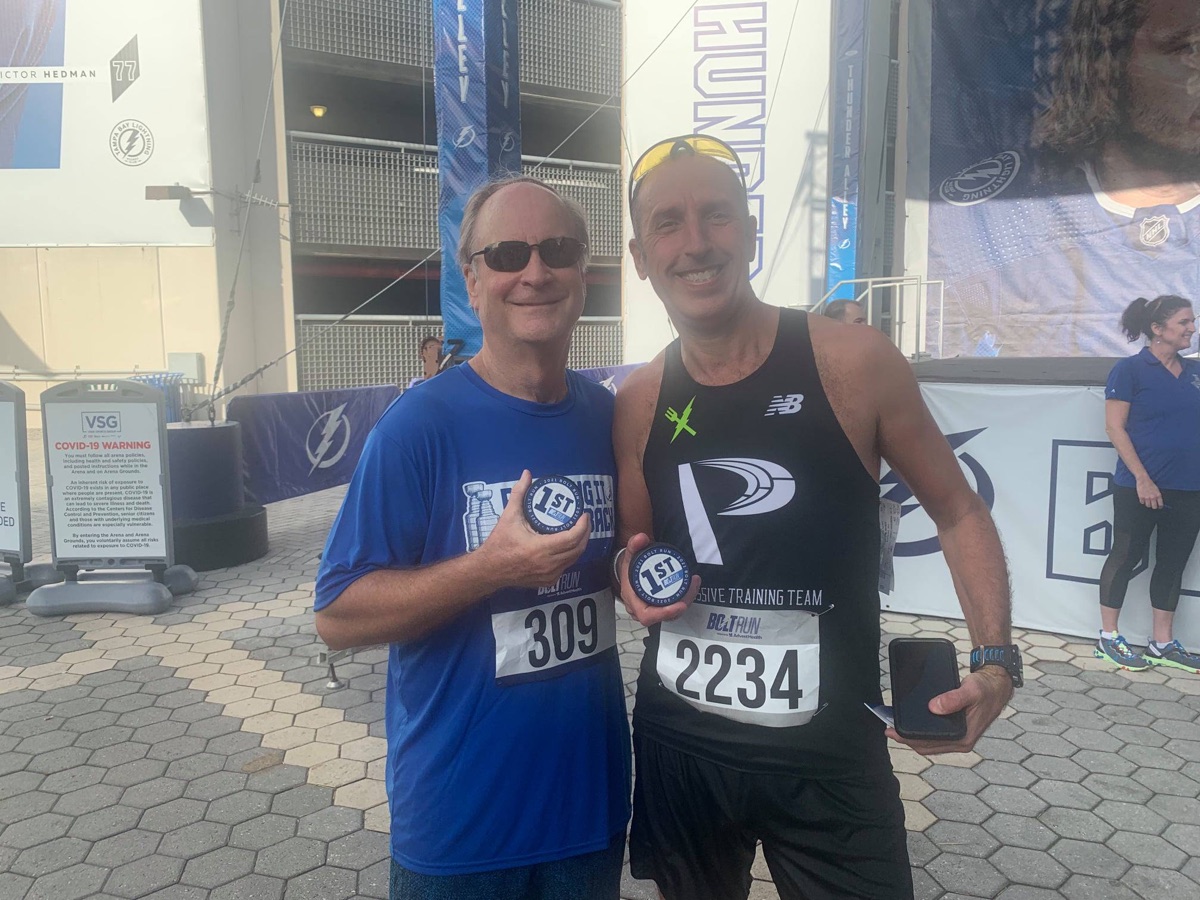 Coach Dror at race with 1st place medal