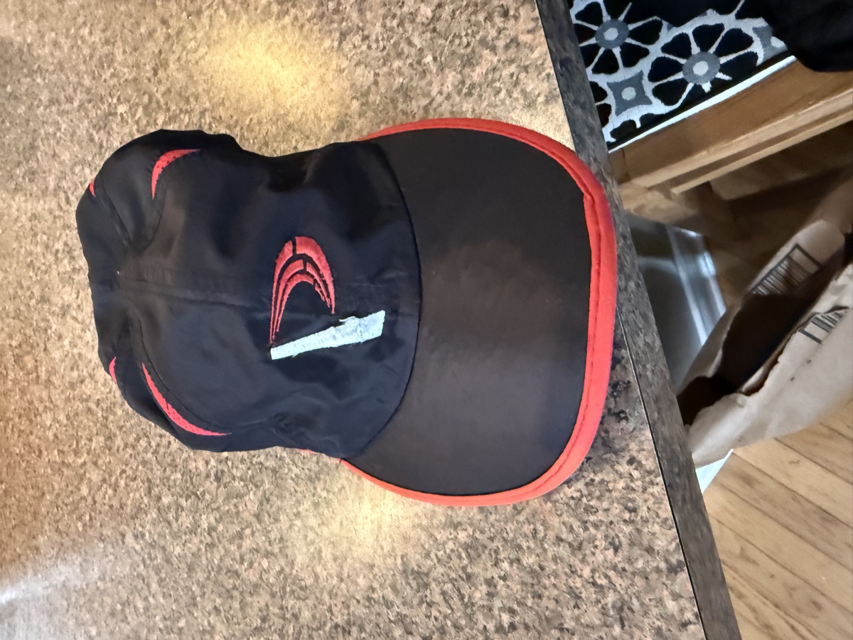 Progressive Training Team cap — black with maroon brim and Progressive logo